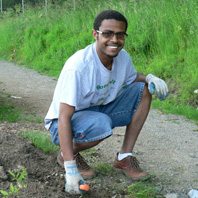 Sudi, a Seattle Community Farm volunteer and Rainier Vista resident
