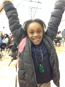 Alivia, an energetic 2nd grader at Emerson, takes the jumping jack challenge!